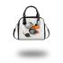 Abstract shapes in black shoulder handbag