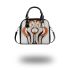 Abstract symmetrical line drawing shoulder handbag