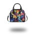 Abstract watercolor painting of the universe shoulder handbag