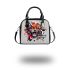 Animal shapes in colorful geometric patterns shoulder handbag