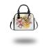 Bee on honeycomb with flowers around shoulder handbag