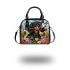 Black and tan dachshund dog surrounded by colorful tulips shoulder handbag