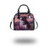 Black and white border collie in the foreground shoulder handbag