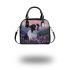 Black and white border collie in the foreground shoulder handbag