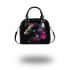 Black background with a colorful horse shoulder handbag