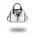 Blue macaw in the style of abstract watercolor shoulder handbag