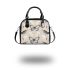 Butterflies and butterfly pattern in soft pink shoulder handbag