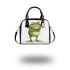 Cartoon drawing of an angry frog standing on its hind legs shoulder handbag