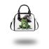 Cartoon frog wearing witch hat shoulder handbag