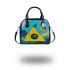 Circles and triangles in a blue sky shoulder handbag