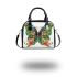 Colorful butterfly with floral designs on its wings shoulder handbag