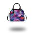 Colorful butterfly with flowers and leaves on purple shoulder handbag