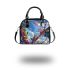 Colorful frogs hanging from tree branches in the jungle shoulder handbag