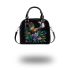 Colorful glowing butterfly surrounded by flowers and leaves shoulder handbag