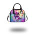 Cute baby owl with big eyes wearing pink and purple dress shoulder handbag