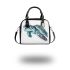 Cute baby turtle in the ocean shoulder handbag