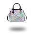 Cute butterfly surrounded by pastel flowers shoulder handbag