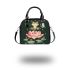 Cute cartoon frog jumping on top of a pink lotus flower shoulder handbag