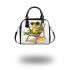 Cute cartoon frog sitting in the sun on an outdoor chair shoulder handbag