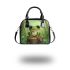 Cute cartoon frog sitting on a tree stump with big eyes shoulder handbag