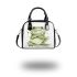 Cute cartoon frog with its front legs crossed shoulder handbag