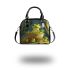 Cute cartoon green frog sitting on top of a bowl shoulder handbag