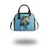 Cute cartoon green frog sitting on top of white sneakers shoulder handbag