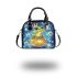 Cute frog wearing a crown sitting on golden ball shoulder handbag