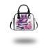 Cute purple owl sitting on top of books surrounded shoulder handbag