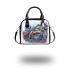 Cute sea turtle swimming in the ocean shoulder handbag