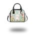 Cute white rabbit sitting on the swing shoulder handbag