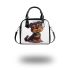 Cute yorkshire terrier sitting with his head tilted back shoulder handbag