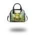 Kawaii cute smiling frog with big eyes sitting on rocks in the jungle shoulder handbag