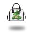 Ominous frog with clover in his hat shoulder handbag