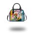 Painting of calla lilies in bold geometric shapes shoulder handbag