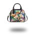 Painting of calla lilies in geometric shapes and forms shoulder handbag