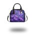Purple crocuses with purple butterflies shoulder handbag