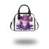 Purple tree frog wearing crown shoulder handbag