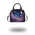 The purple butterflies dance gracefully in the sky shoulder handbag