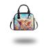 Two cute owls sitting on flowers with colorful butterflies shoulder handbag