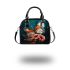 Vibrant butterfly garden shoulder handbag