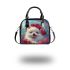 White pomeranian puppy with blue eyes shoulder handbag